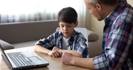 father talking to son