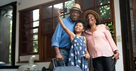 Grandparents and grandchild taking a selfie