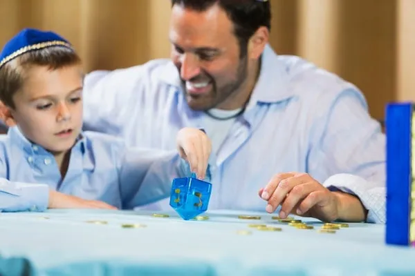 Jewish father and son celebrating