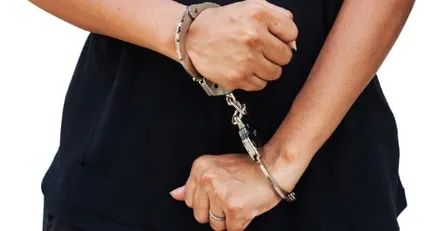 Person in handcuffs