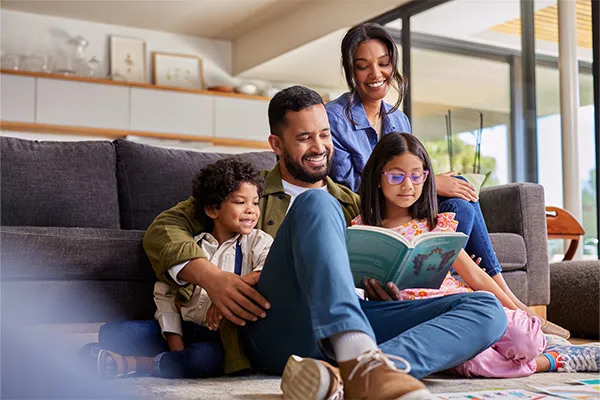 Father reading to his children