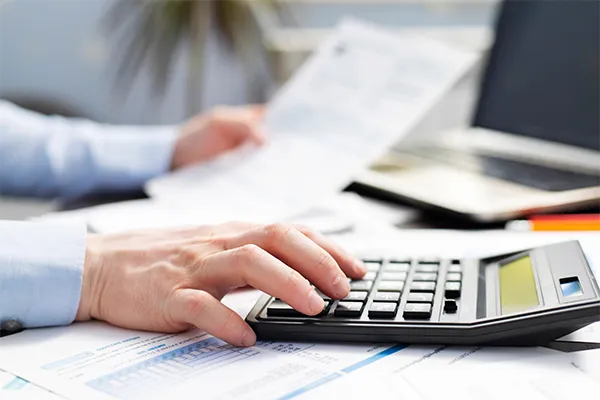Accountant evaluating asset worth