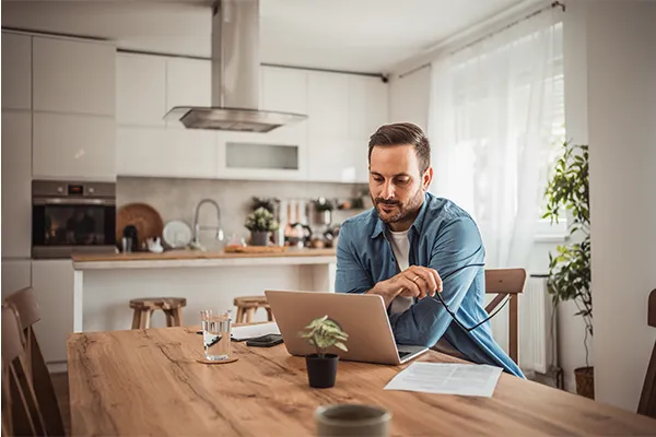 Man looking at his computer