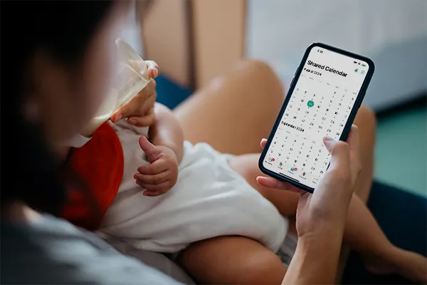 Woman looking at Shared Calendar
