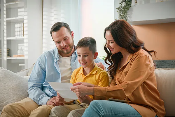 Co-parents sitting with child