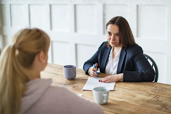 Woman speaking to a lawyer