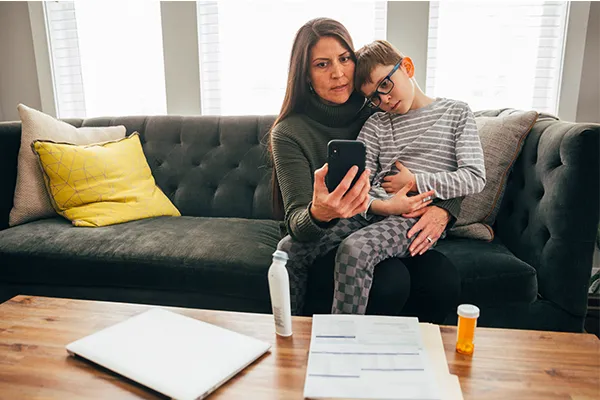 Mother and sick child on a video call