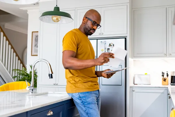 Man opening bills