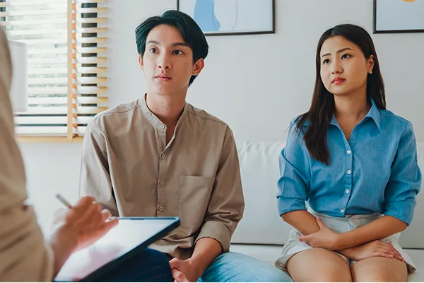 Co-parents meeting with a counselor
