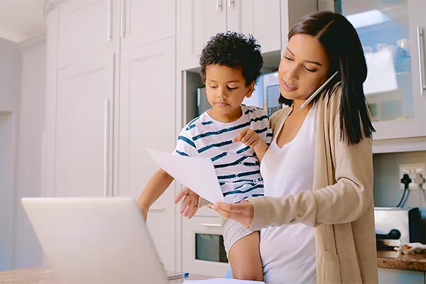 Mother reviewing legal forms