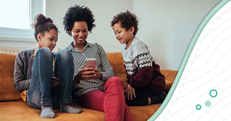 Mother on a couch with her children