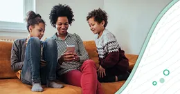 Mother on a couch with her children