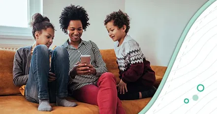Mother on a couch with her children