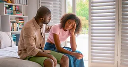 Father talking to teenage daughter