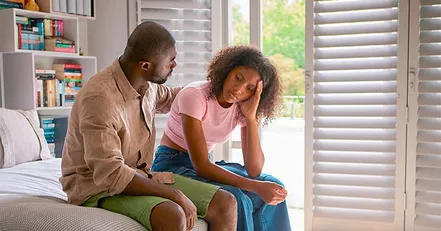 Father talking to teenage daughter