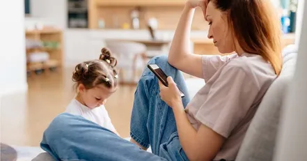 Frustrated mother texting