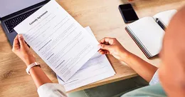 Mother reviewing custody agreement