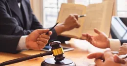 Lawyers looking at legal documents