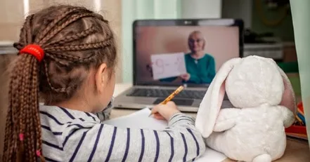 Child taking an online class