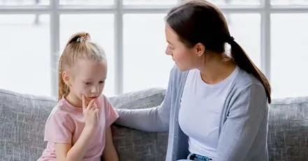 Mother consoling daughter