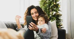 Woman video calling other co-parent