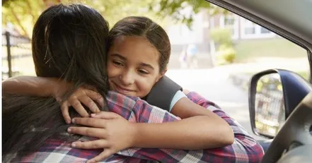 Child hugging mother