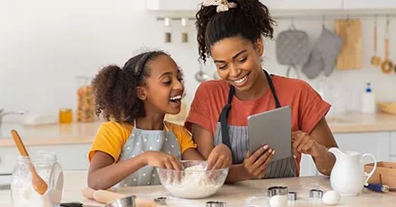 Mother and daughter baking