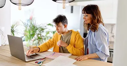 Mother teaching teenage son
