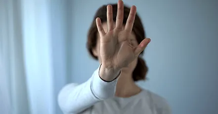 Person holding hand up