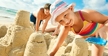 Children building a sandcastle