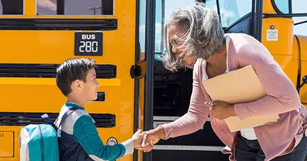 Children boarding a school bus