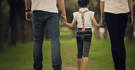 Parents spending quality time with their daughter.