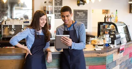 Teenagers working as baristas