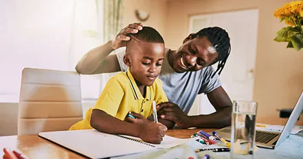 Father and son writing a list