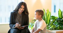 Child talking to adult