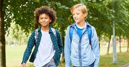 Siblings walking home from school