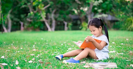 Child reading children’s books about divorce