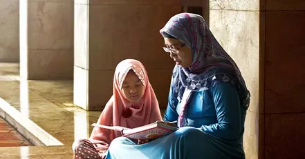 Mother and daughter reading