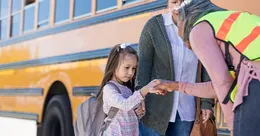 Child meeting bus driver
