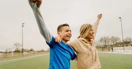Mother and son running