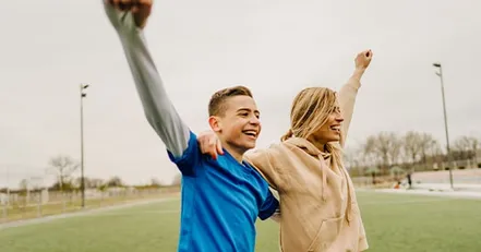 Mother and son running