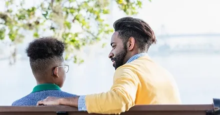 Dad talking to his son about divorce
